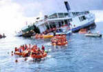 The King cruiser settling in the water after the order to "abandon ship" was given. No one was injured during the evacuation.